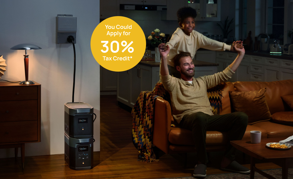 Man and child express happiness, while DELTA 2 Max powers their home via a transfer switch.